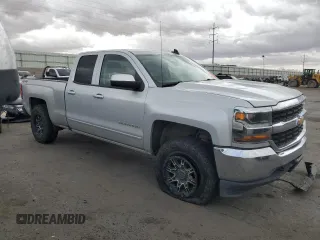 2018 Chevrolet Silverado 1500 LT with VIN 1GCVKREC2JZ180747, listed as a Copart auction lot 50405905 with 131,772 mi miles and Salvage Title. Bid and sale history available at DreamBid. Image 4.