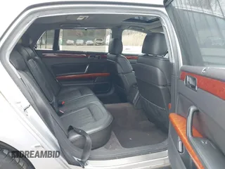 2004 Volkswagen Phaeton V8 z VIN WVWAF63D548007862, wystawiony jako IAAI lot #41721419 z przebiegiem 87 974 mil mil oraz . Historia ofert i sprzedaży dostępna na DreamBid. Obrazek 8.