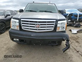 2004 Cadillac Escalade z VIN 1GYEC63T64R260162, wystawiony jako Copart lot #54725685 z przebiegiem 223 615 mil mil oraz Szkody całkowita. Historia ofert i sprzedaży dostępna na DreamBid. Obrazek 5.