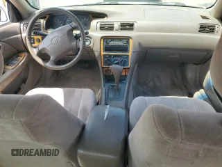 1998 Toyota Camry LE z VIN JT2BG22K4W0197464, wystawiony jako Copart lot #54768195 z przebiegiem Nie podano mil oraz Czysty tytuł • Clean title. Historia ofert i sprzedaży dostępna na DreamBid. Obrazek 8.