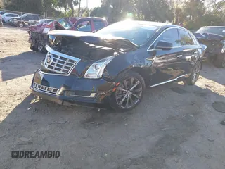 2014 Cadillac XTS with VIN 2G61L5S34E9261034, listed as a IAAI auction lot 41250779 with 178,218 mi miles. Bid and sale history available at carsss.com. Image 2.