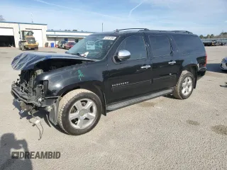 2012 Chevrolet Suburban LT with VIN 1GNSKJE74CR216133, listed as a Copart auction lot 47187385 with 199,922 mi miles and Salvage Title. Bid and sale history available at carsss.com. Image 1.
