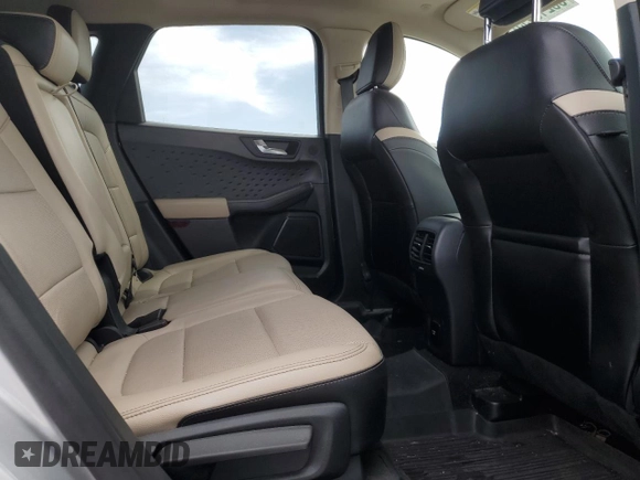 2020 Ford Escape Titanium with VIN 1FMCU9J99LUB07009, listed as a Copart auction lot 63213495 with 61,376 mi miles and Salvage title. Bid and sale history available at DreamBid. Image 11.