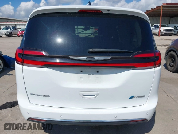 2023 Chrysler Pacifica Hybrid Limited with VIN 2C4RC1S75PR559106, listed as a IAAI auction lot 42613325 with 62,749 mi miles and . Bid and sale history available at DreamBid. Image 15.