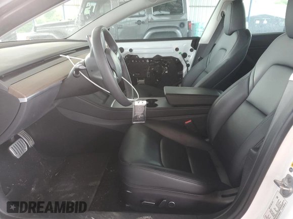 2023 Tesla Model 3 z VIN 5YJ3E1EA1PF543214, wystawiony jako Copart lot #53953185 z przebiegiem 41 701 mil mil oraz Szkoda całkowita • Salvage title. Historia ofert i sprzedaży dostępna na DreamBid. Obrazek 7.