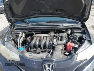 2016 Honda Fit LX with VIN JHMGK5H59GS002090, listed as a IAAI auction lot 41761887 with 97,577 mi miles. Bid and sale history available at carsss.com. Image 10.