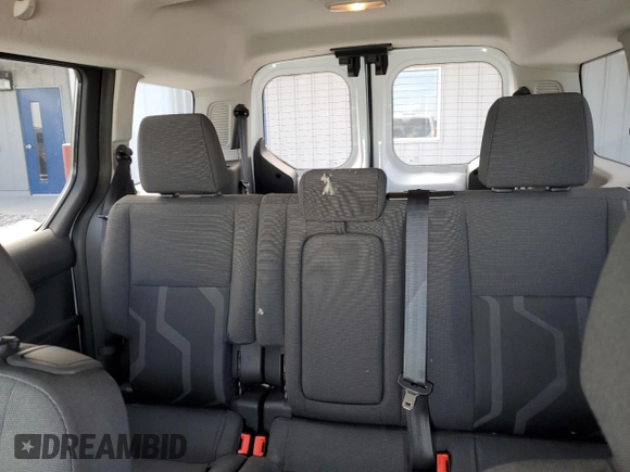 2014 Ford Transit Connect XLT z VIN NM0GS9F70E1137469, wystawiony jako Copart lot #49778625 z przebiegiem 68 323 mil mil oraz Czysty tytuł • Clean title. Historia ofert i sprzedaży dostępna na DreamBid. Obrazek 10.