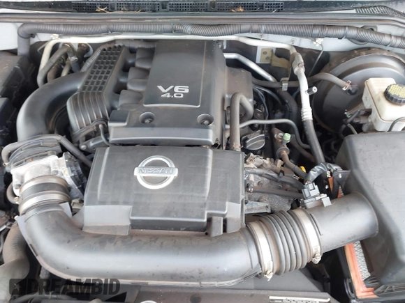 2012 Nissan Pathfinder S z VIN 5N1AR1NN7CC631069, wystawiony jako IAAI lot #39690253 z przebiegiem 135 828 mil mil oraz . Historia ofert i sprzedaży dostępna na DreamBid. Obrazek 10.