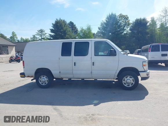 2014 Ford Econoline Cargo Commercial with VIN 1FTNE2EW2EDA18970, listed as a IAAI auction lot 42375174 with 174,022 mi miles and . Bid and sale history available at DreamBid. Image 13.