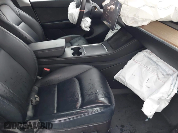 2022 Tesla Model Y Performance with VIN 7SAYGDEFXNF384268, listed as a IAAI auction lot 41558359 with 33,870 mi miles and . Bid and sale history available at DreamBid. Image 5.