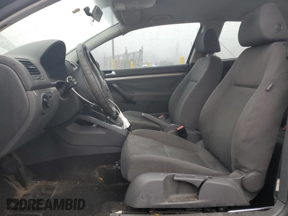 2009 Volkswagen Rabbit S with VIN WVWBB71K89W004528, listed as a Copart auction lot 80742174 with 122,926 mi miles and Salvage title. Bid and sale history available at DreamBid. Image 7.