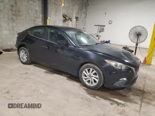 2016 Mazda 3 i Touring with VIN 3MZBM1V74GM254520, listed as a Copart auction lot 62966185 with 99,381 mi miles and Salvage title. Bid and sale history available at DreamBid. Image 4.