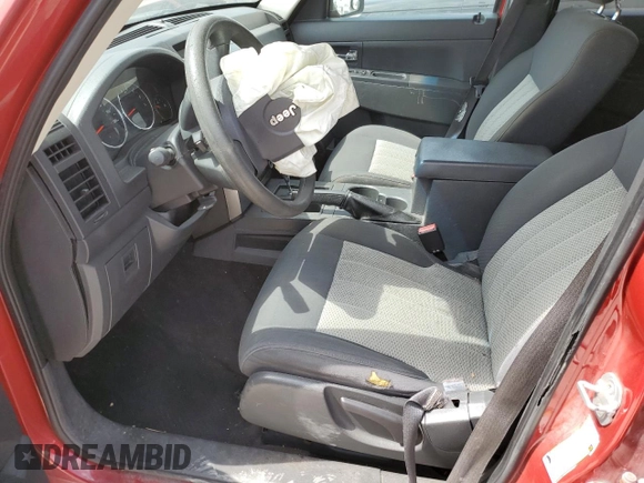 2010 Jeep Liberty Sport z VIN 1J4PP2GK0AW164807, wystawiony jako Copart lot #52411825 z przebiegiem Nie podano mil oraz Szkoda całkowita • Salvage title. Historia ofert i sprzedaży dostępna na DreamBid. Obrazek 7.