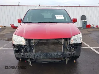 2014 Dodge Grand Caravan SXT with VIN 2C4RDGCG3ER257695, listed as a IAAI auction lot 41534568 with 116,896 mi miles and . Bid and sale history available at DreamBid. Image 13.