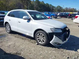 2014 Audi Q5 Premium z VIN WA1CFAFP0EA061818, wystawiony jako IAAI lot #40845361 z przebiegiem 166 333 mil mil oraz . Historia ofert i sprzedaży dostępna na DreamBid. Obrazek 1.