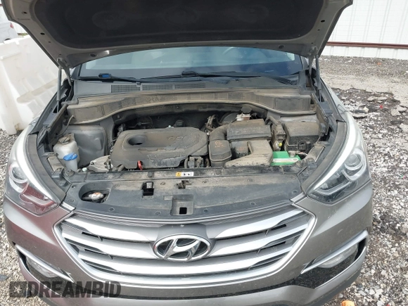 2018 Hyundai Santa Fe 2.4L with VIN 5NMZU3LB1JH100507, listed as a IAAI auction lot 42182116 with 103,826 mi miles and . Bid and sale history available at DreamBid. Image 10.