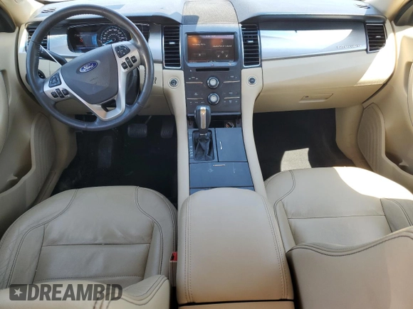2015 Ford Taurus SEL z VIN 1FAHP2E8XFG181929, wystawiony jako Copart lot #64022325 z przebiegiem 106 272 mil mil oraz Szkoda całkowita • Salvage title. Historia ofert i sprzedaży dostępna na DreamBid. Obrazek 8.