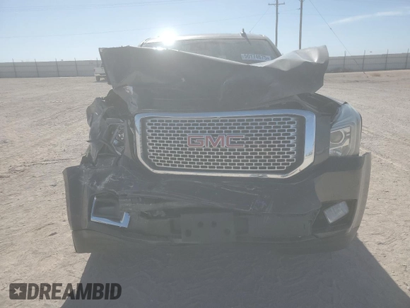 2015 GMC Yukon XL Denali with VIN 1GKS2JKJ3FR743050, listed as a Copart auction lot 50174675 with 143,154 mi miles and Salvage Title. Bid and sale history available at carsss.com. Image 5.