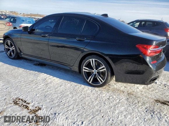 2016 BMW 7 Series 750i xDrive with VIN WBA7B0C50GG526899, listed as a Copart auction lot 46712485 with 97,985 mi miles and Salvage title. Bid and sale history available at DreamBid. Image 2.