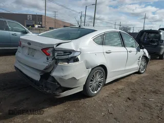 2014 Ford Fusion SE with VIN 3FA6P0H95ER361049, listed as a IAAI auction lot 41864864 with 210,229 mi miles. Bid and sale history available at carsss.com. Image 4.