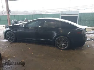 2022 Tesla Model S Plaid with VIN 5YJSA1E64NF477855, listed as a IAAI auction lot 41470591 with Not provided miles and . Bid and sale history available at DreamBid. Image 14.
