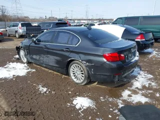 2011 BMW 5 Series 535i xDrive with VIN WBAFU7C52BC777616, listed as a IAAI auction lot 41599614 with 150,723 mi miles. Bid and sale history available at carsss.com. Image 3.