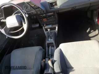 1987 Nissan Sentra z VIN JN1PB2411HU026525, wystawiony jako Copart lot #78997744 z przebiegiem 65 716 mil mil oraz Nie do naprawy. Historia ofert i sprzedaży dostępna na DreamBid. Obrazek 8.