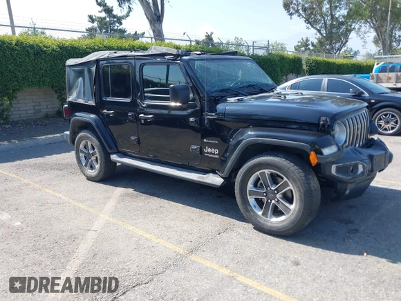 2018 Jeep Wrangler Unlimited Sahara with VIN 1C4HJXEN7JW328981, listed as a IAAI auction lot 42217508 with 59,584 mi miles and . Bid and sale history available at DreamBid. Image 1.