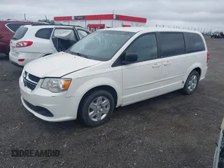 2012 Dodge Grand Caravan SE with VIN 2C4RDGBG8CR115003, listed as a IAAI auction lot 42217153 with 196,833 mi miles and . Bid and sale history available at DreamBid. Image 2.