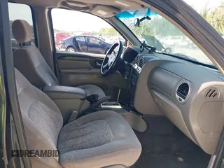 2004 GMC Envoy SLE with VIN 1GKDS13S342117178, listed as a IAAI auction lot 42164611 with 181,287 mi miles and . Bid and sale history available at DreamBid. Image 5.