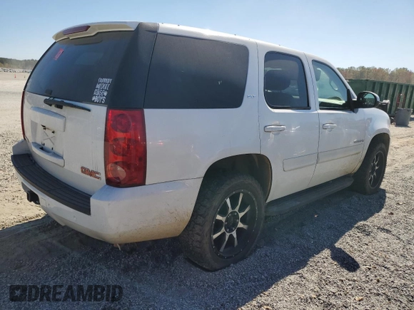 2007 GMC Yukon SLE with VIN 1GKFK13017J109923, listed as a Copart auction lot 77085954 with 214,986 mi miles and Salvage Title. Bid and sale history available at carsss.com. Image 3.