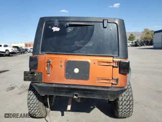 2011 Jeep Wrangler Unlimited Sahara with VIN 1J4BA5H19BL588797, listed as a Copart auction lot 72681904 with 100,763 mi miles and Salvage Title. Bid and sale history available at carsss.com. Image 6.