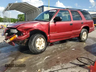 2000 Chevrolet Blazer LT z VIN 1GNDT13WXY2287496, wystawiony jako Copart lot #58950255 z przebiegiem 245 512 mil mil oraz Szkoda całkowita • Salvage title. Historia ofert i sprzedaży dostępna na DreamBid. Obrazek 1.