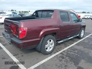 2009 Honda Ridgeline RTL with VIN 5FPYK16539B101836, listed as a IAAI auction lot 41894409 with 185,325 mi miles. Bid and sale history available at carsss.com. Image 4.
