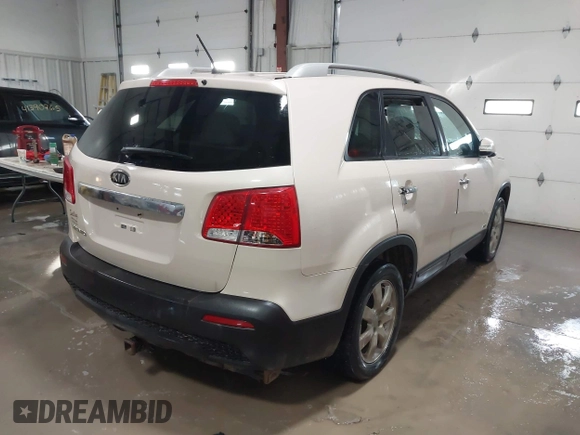 2012 Kia Sorento LX with VIN 5XYKTDA25CG226072, listed as a IAAI auction lot 41398669 with 229,218 mi miles. Bid and sale history available at carsss.com. Image 4.