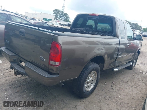 2002 Ford F-150 XL with VIN 2FTRX18W22CA23065, listed as a IAAI auction lot 42128001 with 262,452 mi miles and . Bid and sale history available at DreamBid. Image 4.