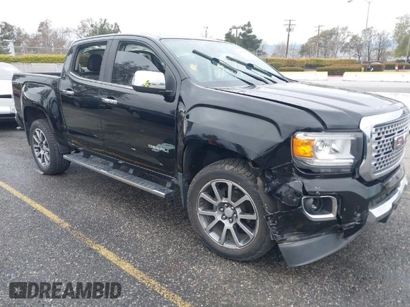 2018 GMC Canyon 4WD Denali with VIN 1GTG6EEN7J1318059, listed as a IAAI auction lot 41772860 with 80,230 mi miles. Bid and sale history available at carsss.com. Image 1.