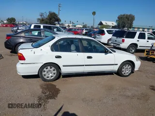 2000 Honda Civic LX with VIN 2HGEJ6673YH502410, listed as a IAAI auction lot 41992745 with 173,958 mi miles. Bid and sale history available at carsss.com. Image 13.