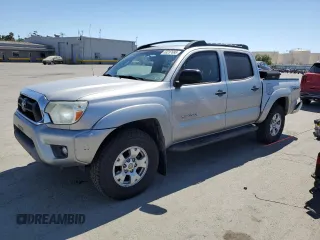 2015 Toyota Tacoma PreRunner with VIN 3TMJU4GN5FM175027, listed as a Copart auction lot 63237695 with 212,869 mi miles and Salvage title. Bid and sale history available at DreamBid. Image 1.