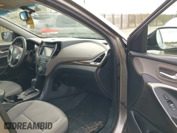 2018 Hyundai Santa Fe 2.4L z VIN 5NMZUDLB4JH073857, wystawiony jako IAAI lot #42200208 z przebiegiem 127 038 mil mil oraz . Historia ofert i sprzedaży dostępna na DreamBid. Obrazek 5.