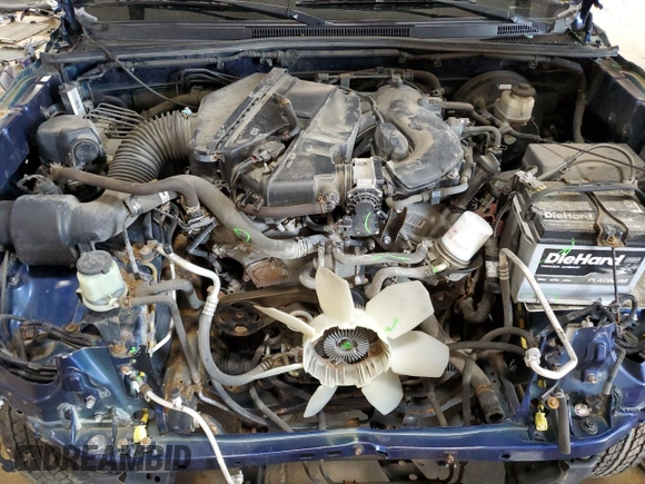 2015 Toyota Tacoma with VIN 3TMLU4EN6FM186016, listed as a Copart auction lot 58404675 with 127,536 mi miles and Salvage title. Bid and sale history available at DreamBid. Image 11.