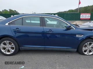 2016 Ford Taurus SEL z VIN 1FAHP2E81GG111690, wystawiony jako IAAI lot #42461206 z przebiegiem 92 424 mil mil oraz . Historia ofert i sprzedaży dostępna na DreamBid. Obrazek 14.