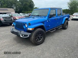 2021 Jeep Gladiator 80th Anniversary с VIN 1C6HJTAG8ML520827, выставлен на аукционе Copart как лот 63643585 с пробегом 128 279 миль миль и Чистый • Clean title. История ставок и продаж доступна на DreamBid. Изображение 1.