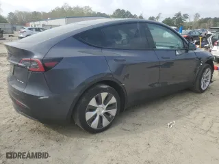 2023 Tesla Model Y Long Range with VIN 7SAYGDEEXPF619102, listed as a Copart auction lot 51060285 with 54,094 mi miles and Salvage Title. Bid and sale history available at carsss.com. Image 3.