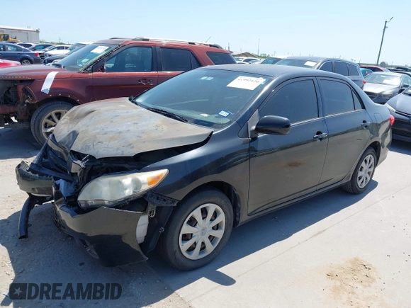 2011 Toyota Corolla L with VIN JTDBU4EE9BJ096586, listed as a IAAI auction lot 41992120 with 201,297 mi miles. Bid and sale history available at carsss.com. Image 2.