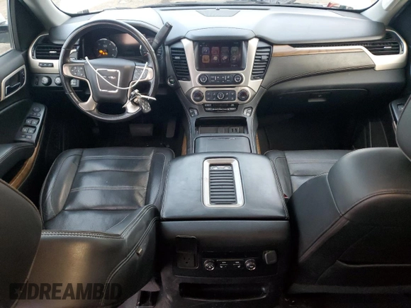 2020 GMC Yukon XL Denali with VIN 1GKS2HKJ1LR299560, listed as a Copart auction lot 84943284 with 99,084 mi miles and Salvage Title. Bid and sale history available at carsss.com. Image 8.