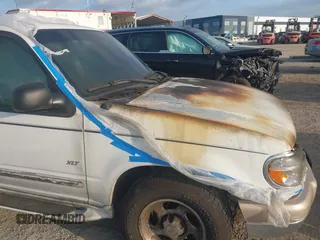1998 Ford Explorer XLT z VIN 1FMZU32P9WZC01127, wystawiony jako IAAI lot #42310558 z przebiegiem Nie podano mil oraz . Historia ofert i sprzedaży dostępna na DreamBid. Obrazek 11.