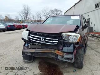 2012 Honda Pilot EX-L with VIN 5FNYF4H65CB045796, listed as a IAAI auction lot 39867772 with 104,061 mi miles. Bid and sale history available at carsss.com. Image 6.
