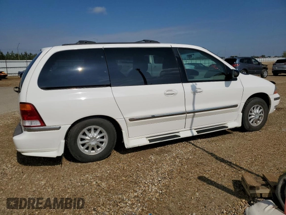 2001 Ford Windstar SEL with VIN 2FMDA56461BA55148, listed as a Copart auction lot 66531405 with 74,409 mi miles and Salvage title. Bid and sale history available at DreamBid. Image 3.