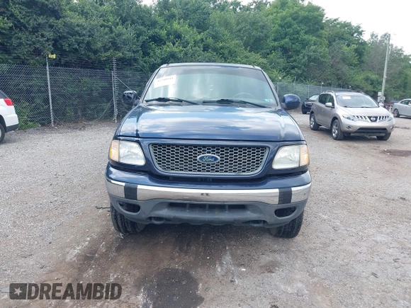 2003 Ford F-150 XLT with VIN 1FTRW08L73KB50541, listed as a IAAI auction lot 42740941 with 181,828 mi miles and . Bid and sale history available at DreamBid. Image 6.